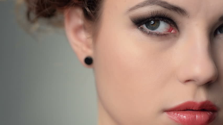 closeup half face portrait of beautiful woman

