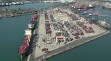 Aerial of large container terminal and ships in the harbor,