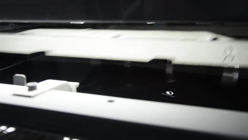 print house offset press machine. printed paper is delivered at the collector.