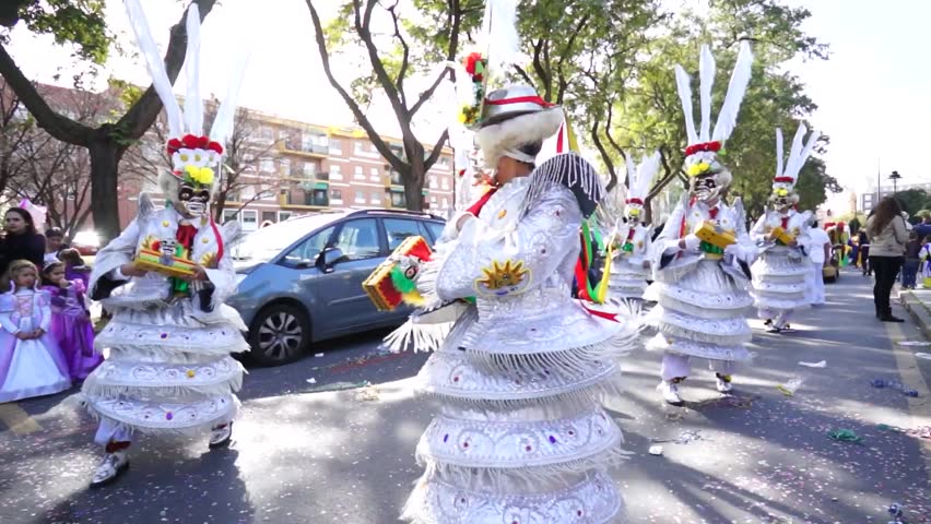 HUELVA, ANDALUSIA, SPAIN - FEBRUARY 10: The Carnival parade of Huelva, procession with people in traditional street, on February 10, 2013 in Huelva, Andalusia, Spain 