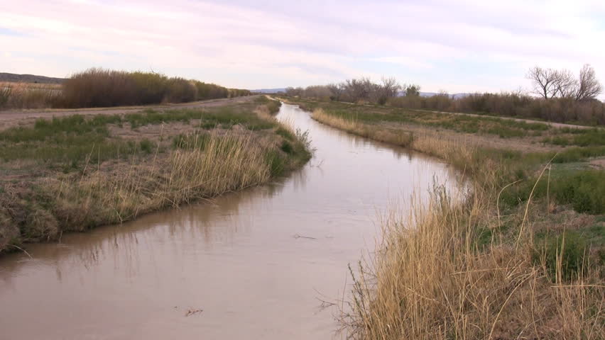 An irrigation ditch at Bosque del Apache National Wildlife Refuge, New Mexico, USA.