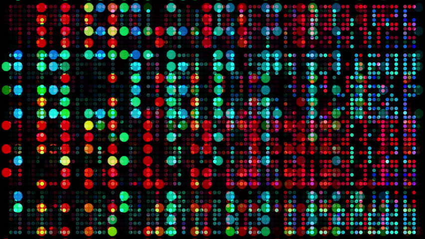 abstract colourful pattern of LED light squares. Could be a video wall or projection
