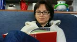 brunette girl browsing recipes book