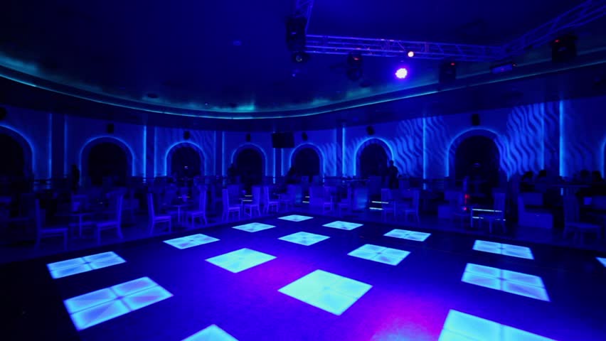 Waiter Walks In Club With Dance Floor Near Stage And Bar Panoramic