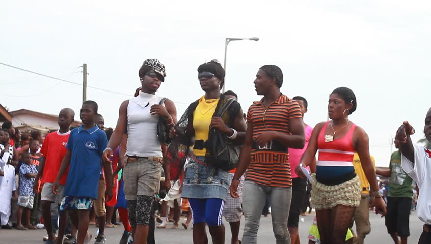 ACCRA, GHANA - CIRCA DEC 2012: People in the street during the Homowo Festival in Accra, Ghana circa December 2012. Celebrated by the Ga people in remembrance of a historical famine.
