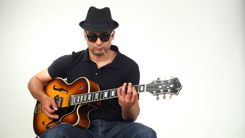 jazz-guitarist-filmed-in-studio-stock-footage-video-3497996-shutterstock