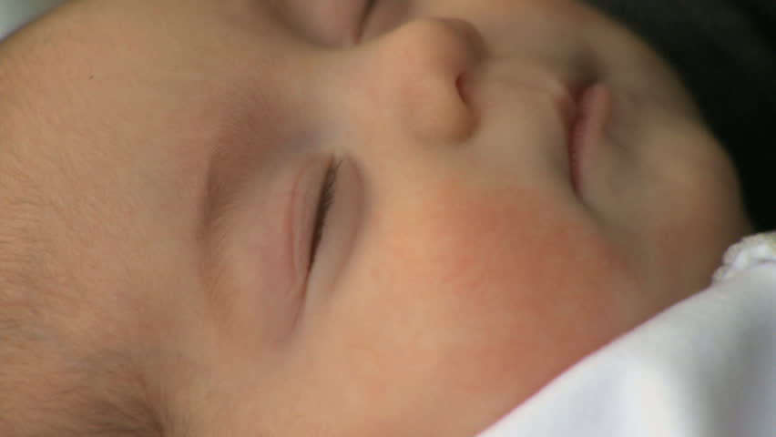 A two month old infant sleeping