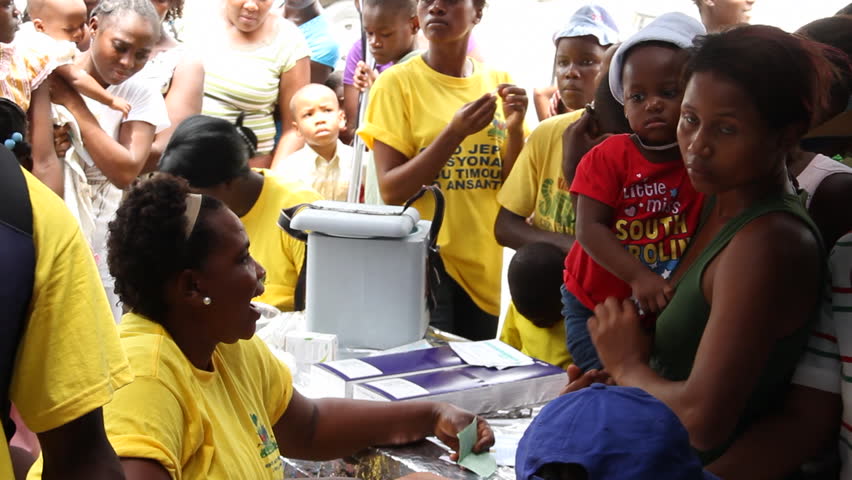 HAITI - CIRCA MAY 2012: registration table at vaccination clinic in Port Au Prince. 