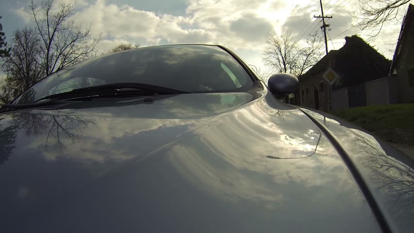 Car Mount Camera Shot Driving Through the Streets of City.
Exterior view of a car driving on a road. HD1080p.