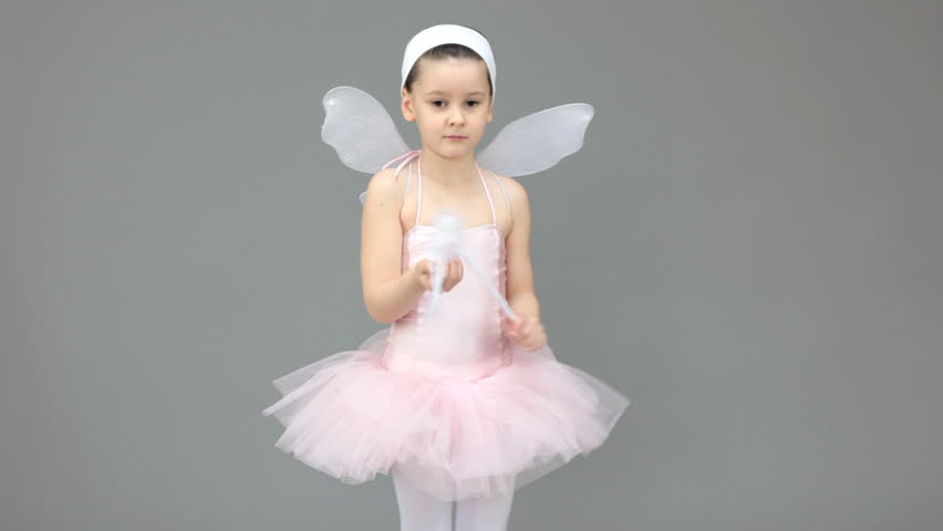Sweet little ballerina girl dances like a fairy