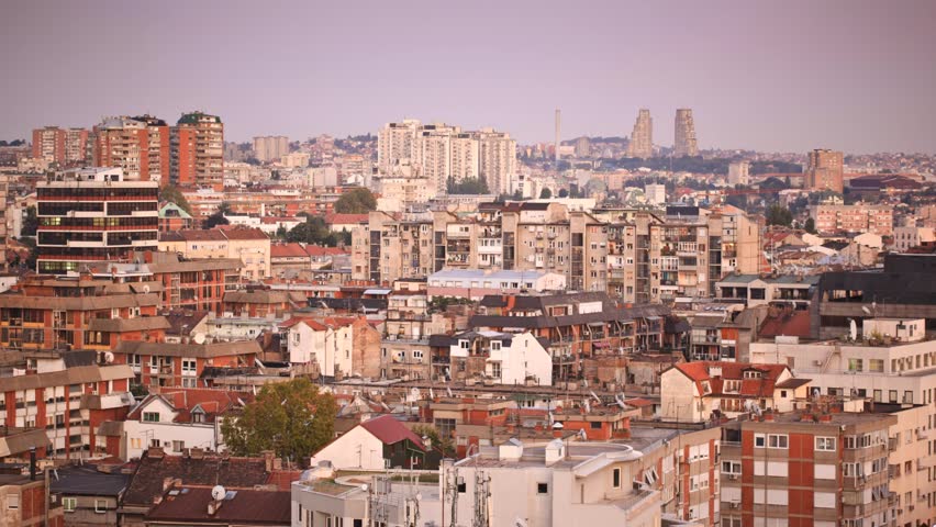 Sunset over the city, transition from day to night (time lapse / timelapse)