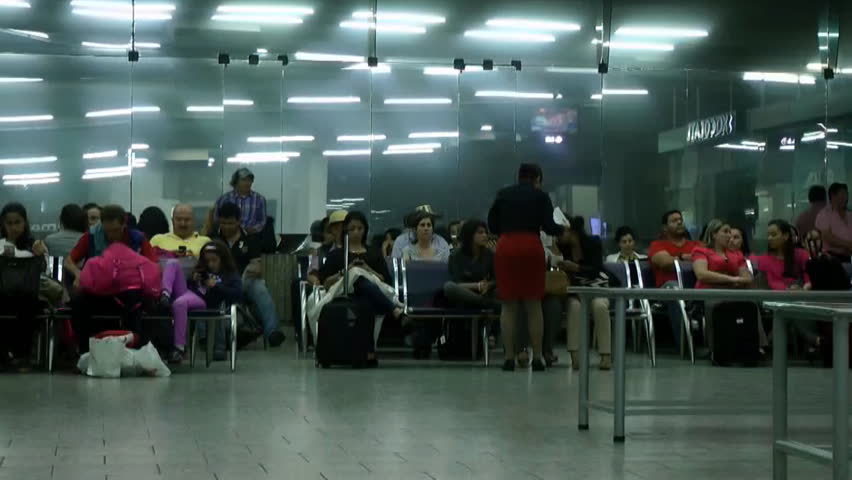 BOGOTA, COLOMBIA - JANUARY 12: Passengers boarding an aircraft shown on January 12, 2013 in Bogota, Colombia.