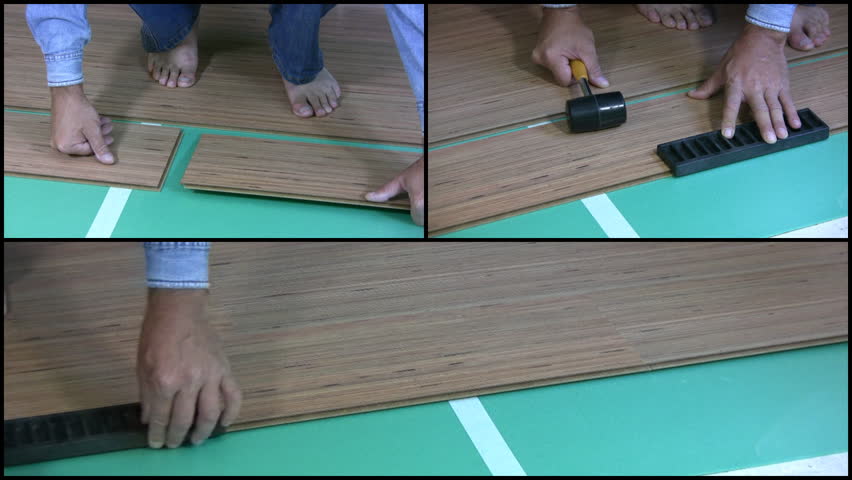 Men barefoot in blue jeans and blue denim shirt, puts on the floor of the room laminate. Close-up. Visible legs, hands and tools