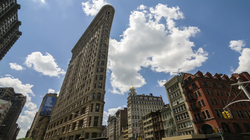 NEW YORK - AUGUST 16, 2012: Flatiron Building on August 16, 2012 in New York. Flatiron Building, located at 175 Fifth Avenue in the borough of Manhattan, is considered a groundbreaking skyscraper.