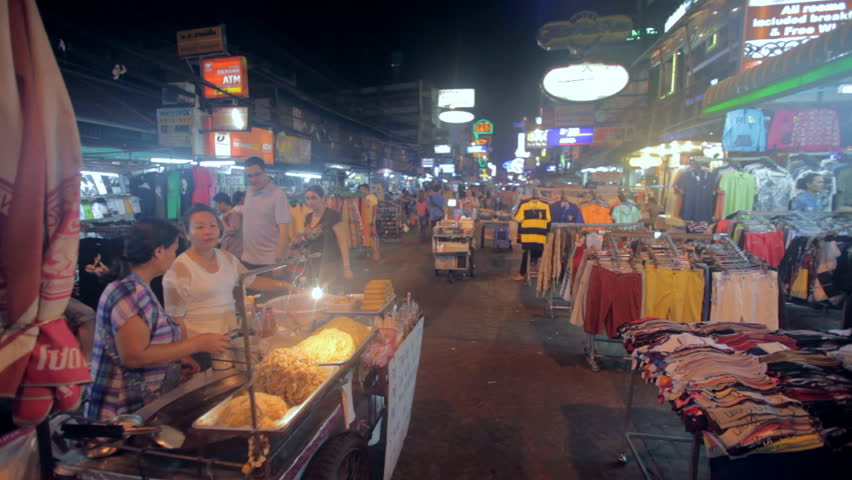 BANGKOK - NOV 20: Food vendors on Khao San Road at night on 20 November 2012 in Bangkok, Thailand. Khao San road is the mekka for all tourists arriving in the capital.