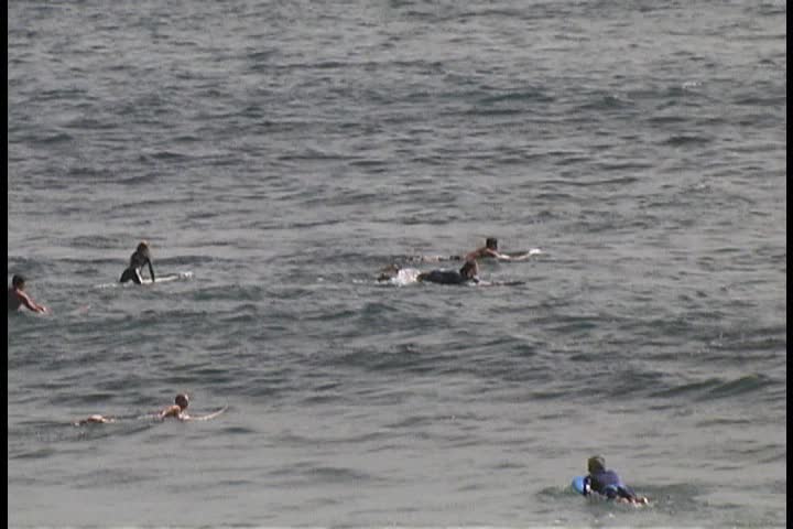 Surfer misses a wave