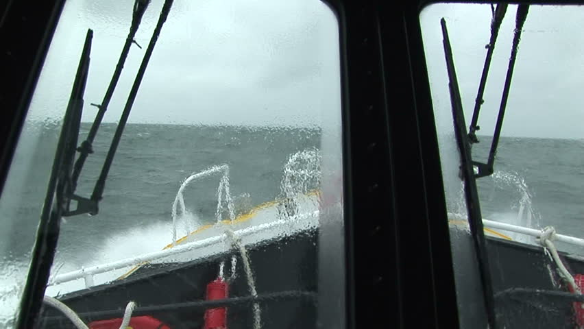 Pilot boat navigating through big waves on the Columbia River, OR. POV