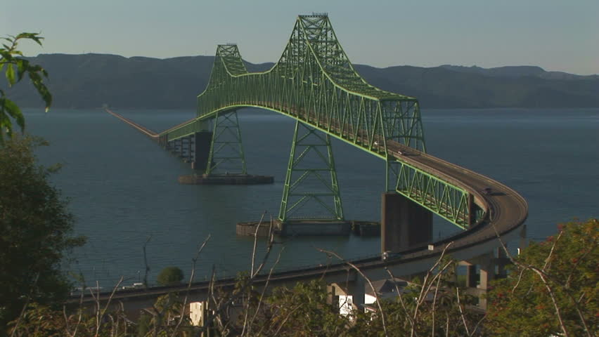Full view of Astoria bridge with passing automobiles, OR