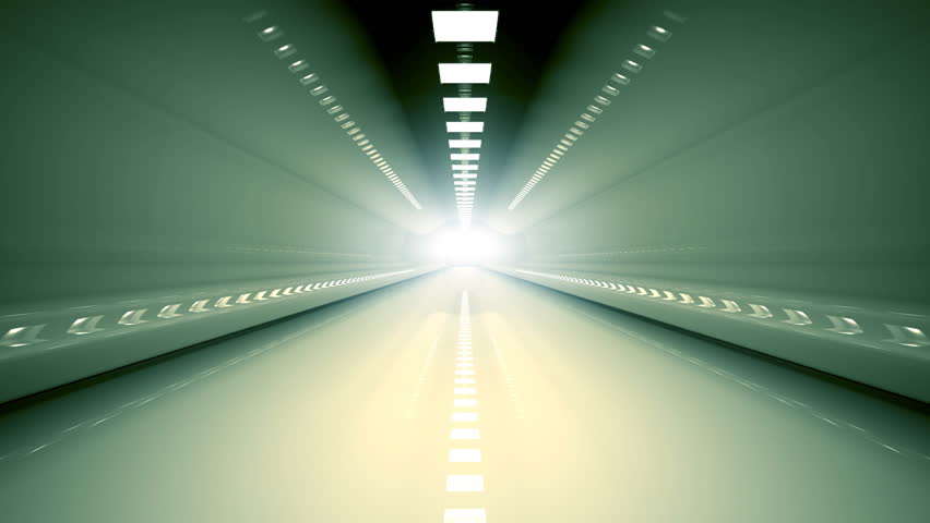 Camera moves slowly towards light at the end of the tunnel.