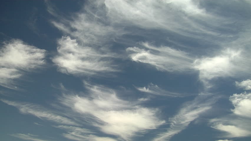 Classic Cirrus Uncinus. "Mares' Tails" formed by falling ice crystals into strongly wind sheared atmosphere.