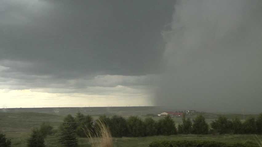 Wet Microburst! Massive wall of wind and water from a wet microburst; winds gust to 65 mph