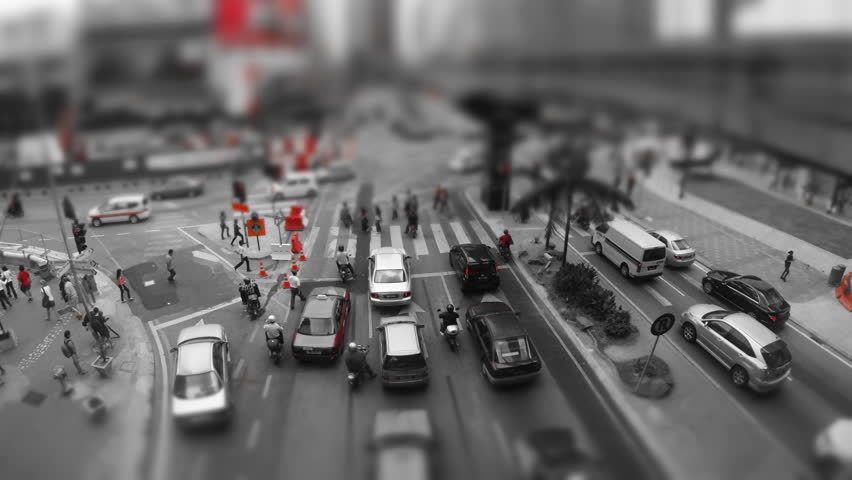 KUALA Lumpur, 21 March:  (Color Graded) tilt shift time lapse vertical pan of the traffic on Jalan Bukit Bintang in Kuala Lumpur Malaysia on 21 March 2013