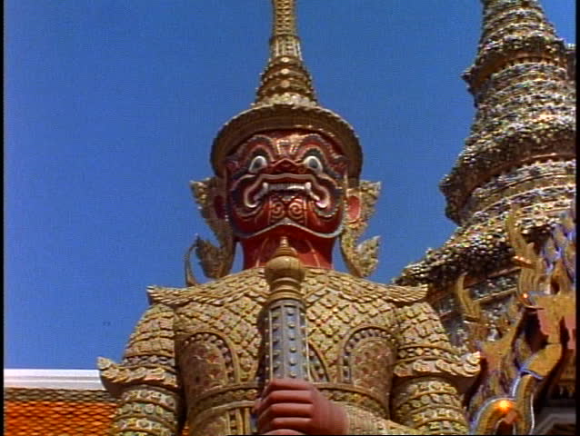 Royal Palace of Bangkok, medium shot dragon monkey god statue, close up face