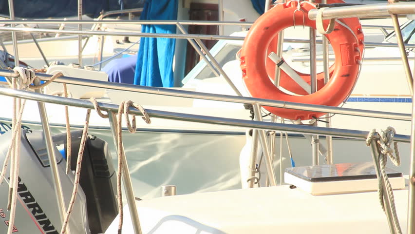 red life preserver tied to a boat anchored at Jaffa port