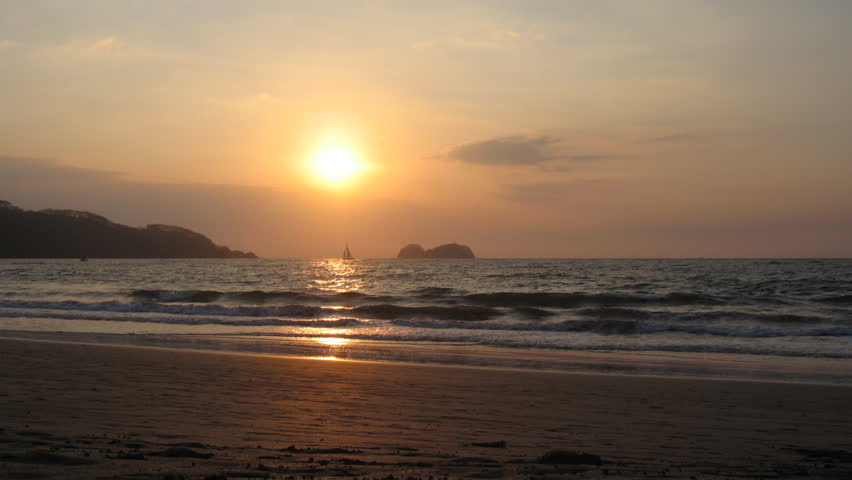 COSTA RICA - MAR 2013: Timelapse shot of Playas Hermosa during sunset in Costa Rica, March 2013.