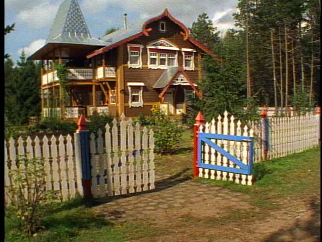 Russian Village houses, quaint, colorful, tilt up, red and silver, gate