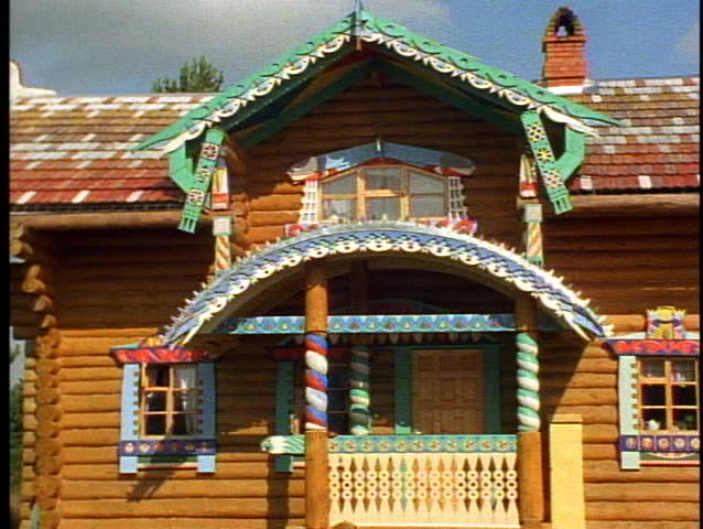 Russian Village houses, quaint, colorful, close-up zoom out, orange