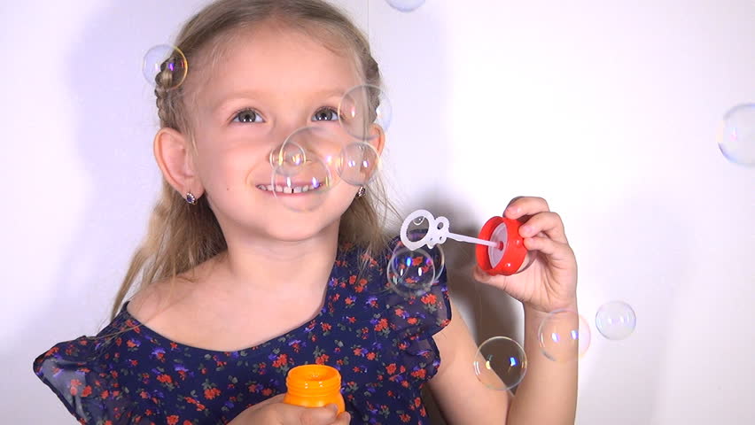Child Blowing Soap Bubbles, Little Girl Playing making Balloons, Children 