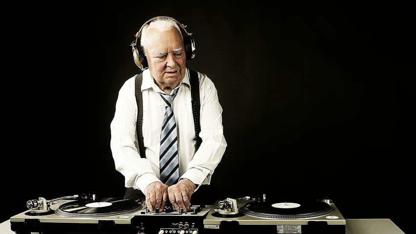 a very funky elderly grandpa dj mixing records
