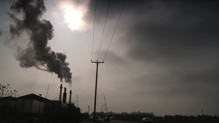 Smoking chimneys polluting the air