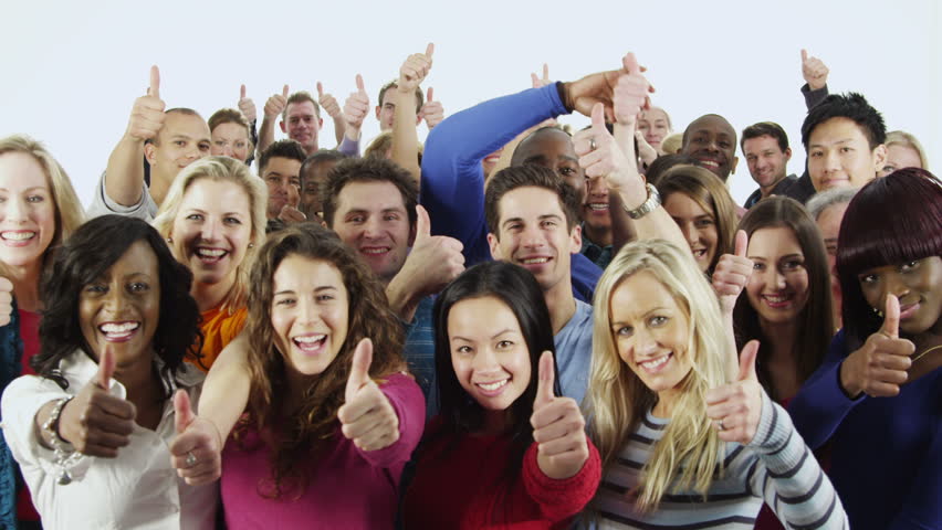 Portrait of a happy and diverse multi ethnic group of people in colorful casual clothing, isolated on white in a studio shot. They all hold their thumbs up to camera as a sign of their success.