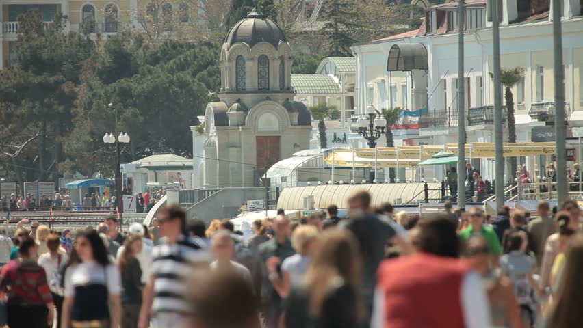 Crowd of people walking on the sea promenade. Yalta, Crimea