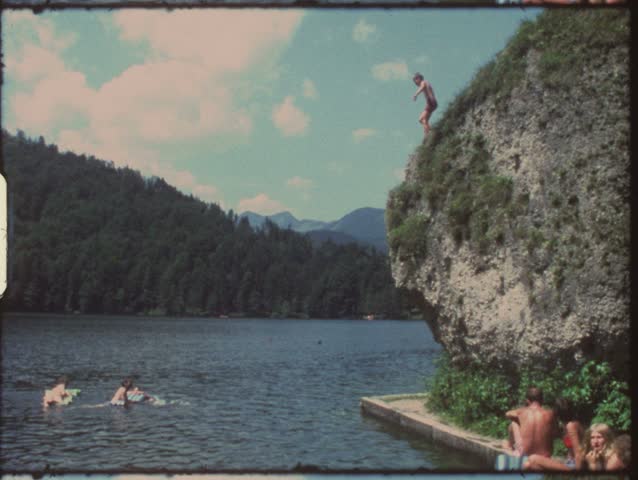 Vintage 8mm film: Children jumping in lake