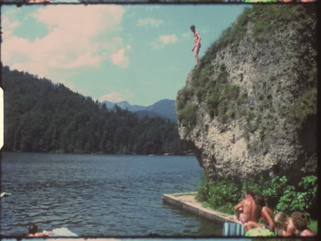 Vintage 8mm film: Children jumping in lake