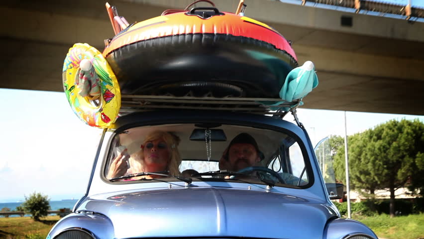 Family talking on their way to summer holiday