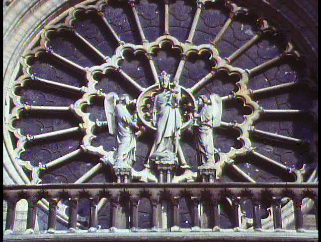 Paris, France, Notre Dame, close up of rose window, zoom out to wide shot of two towers