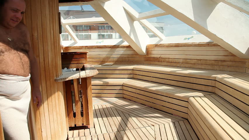 Several people in sauna sweating