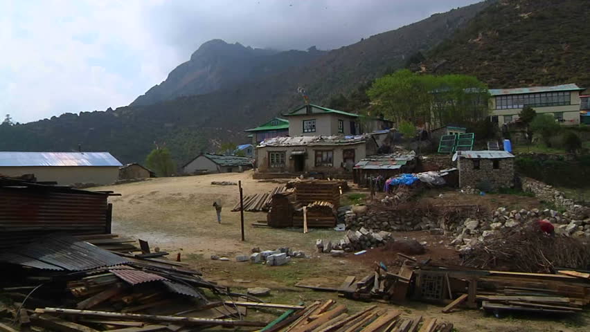 Villagers walk around their small Sherpa village at the edge of Namche Bazaar, on the way to Mt. Everest. 