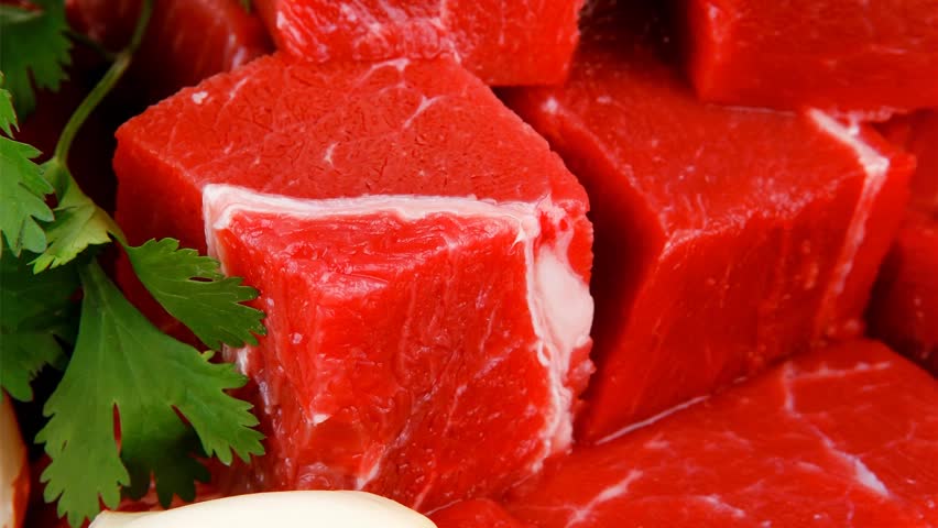slices of raw fresh beef meat fillet in a ceramic dish with onions and peppers 1920x1080 intro motion slow hidef hd