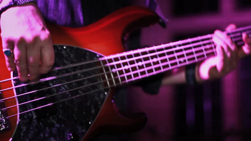Bass Guitar Finger Picking, Close Up - On Stage, Rock Concert