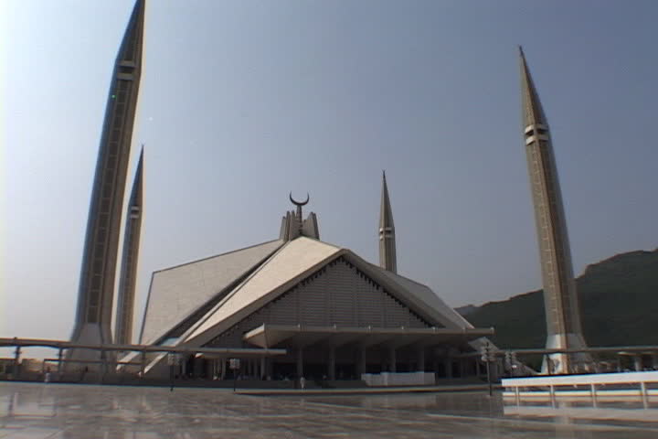 ISLAMABAD, PAKISTAN - CIRCA JUNE 1990: Exterior Faisal mosque and its tall pencil-like minarets.