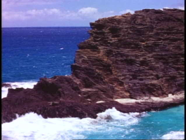 Hawaii, Island of Oahu cliffs and sea, rugged and jagged, medium shot