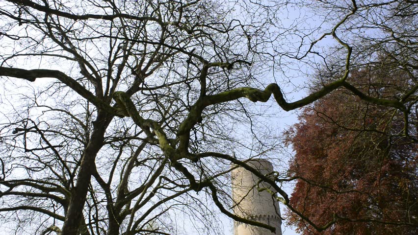 Water tower in park in Bruges, Belgium - slide from the top to the bottom