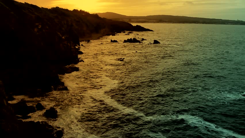 Rocks at the Edge of Stormy Ocean Color Enhanced Shot HD