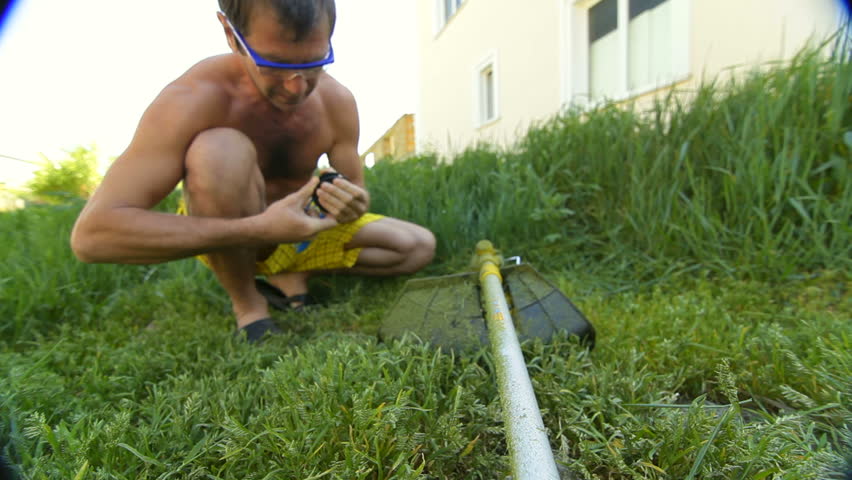 Houseowner With Rotary Lawn Mower