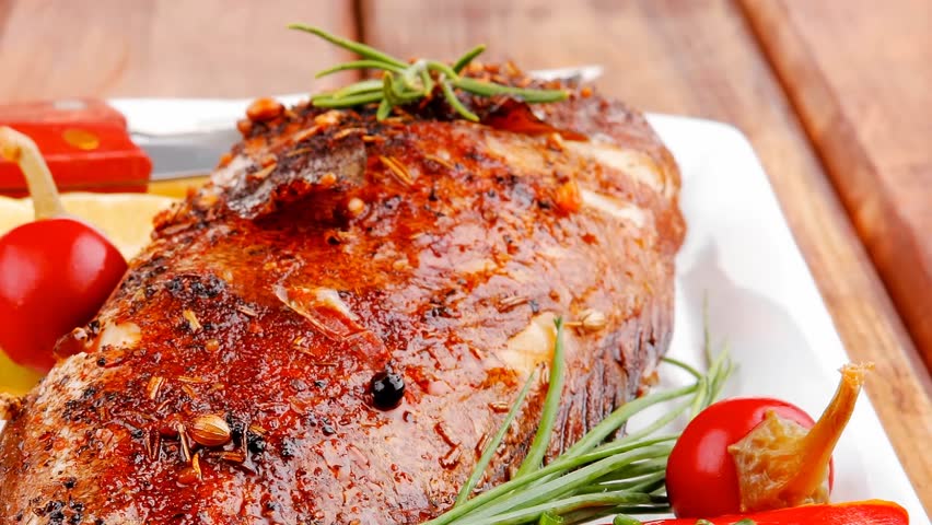 savory on wood: whole fried sunfish over plate with tomatoes lemons and peppers 1920x1080 intro motion slow hidef hd